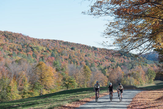 Three cyclists on a road with Wahoo Bike computers