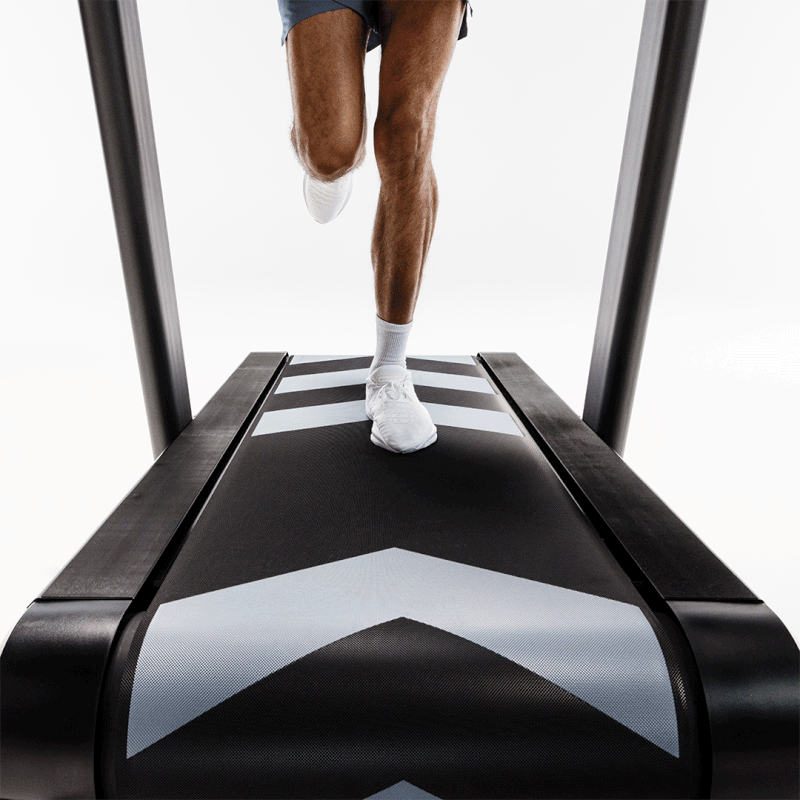 MAn running on the KICKR run smart treadmill from wahoo